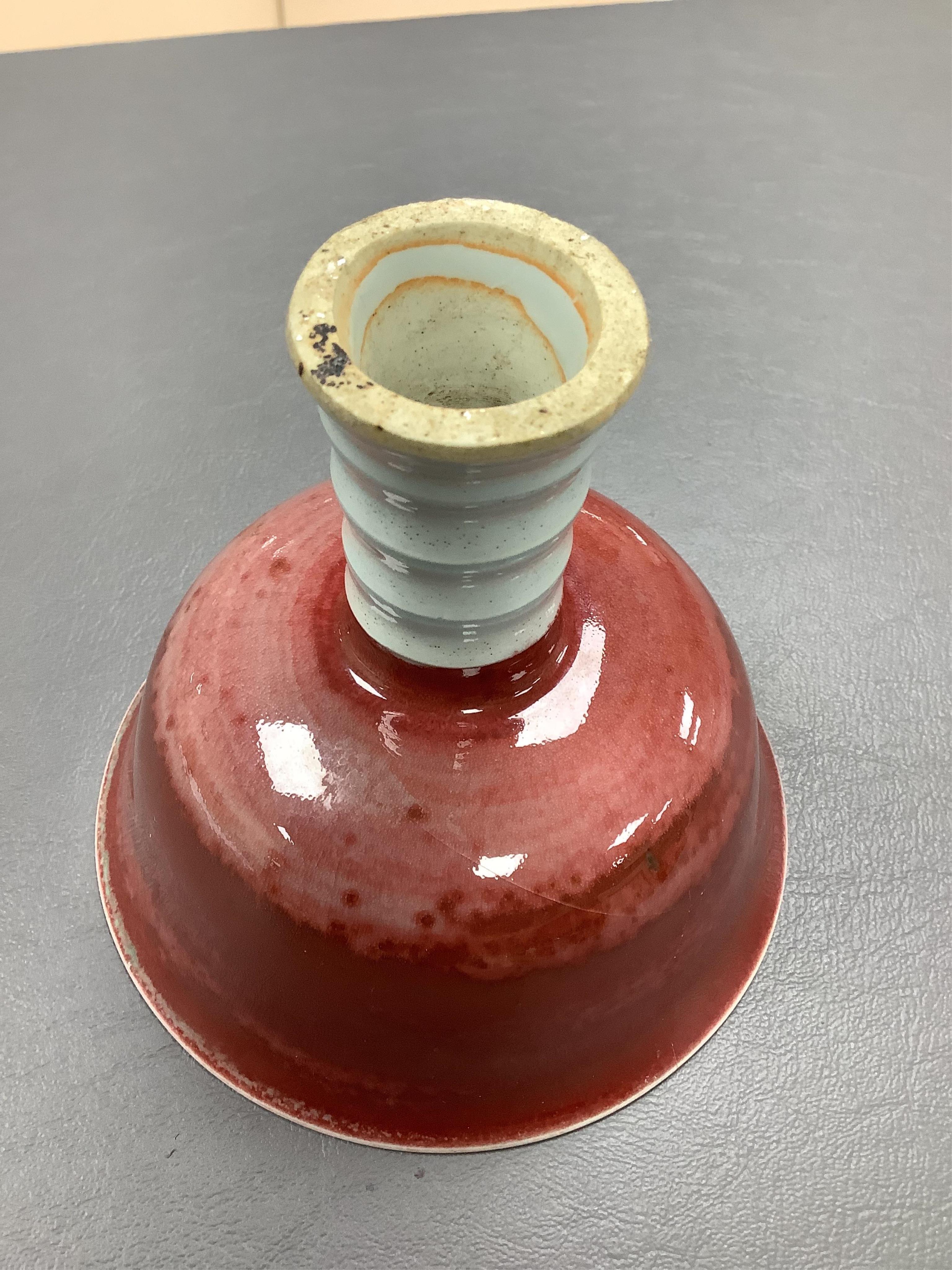 An early 20th century Chinese famille rose teapot, later famille rose teabowl, sang de boeuf stem bowl and two others, tallest 11cm. Condition - varies